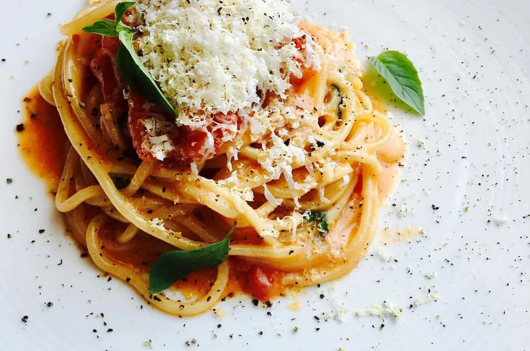 La Tavola Trattoria signature dishes Tagliatelle BologneseVeal MeatballsSpaghetti Cacio e Pepe